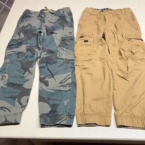 Bundle 2 pairs Wrangler boys cargo pants size 7 camo
And tan